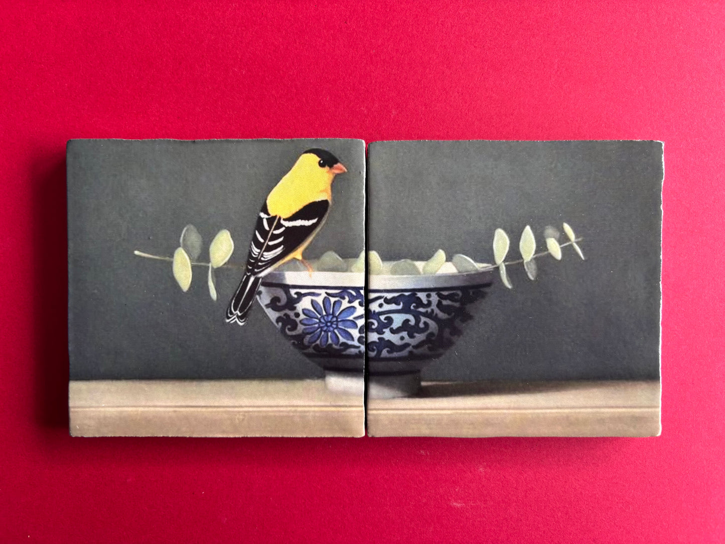 Tweeluik Vogel op kom met tak