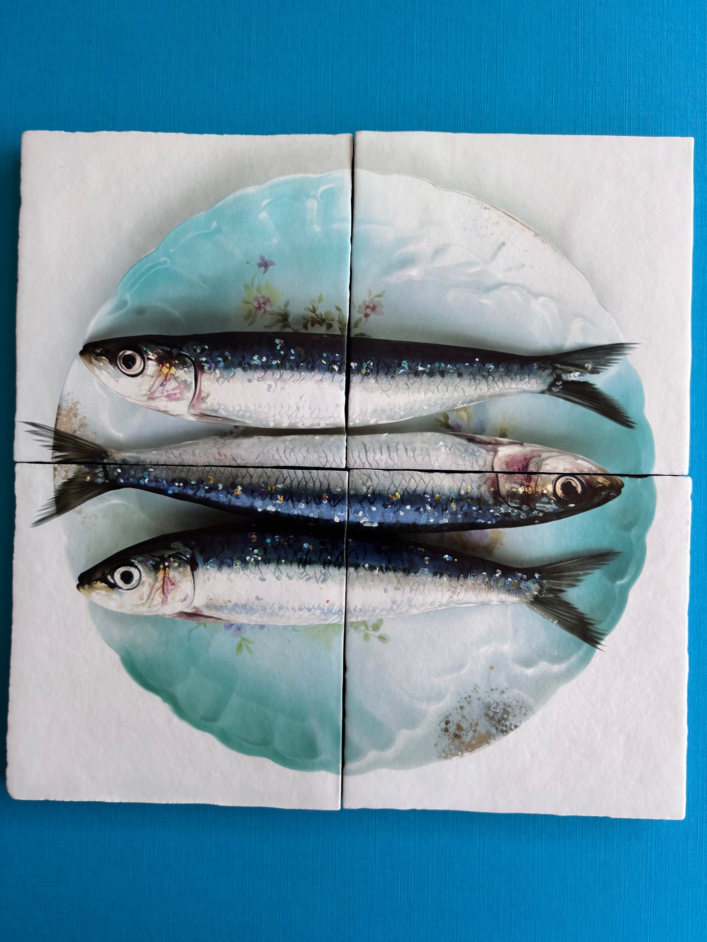 Tegel Vierluik Sardines op een bord